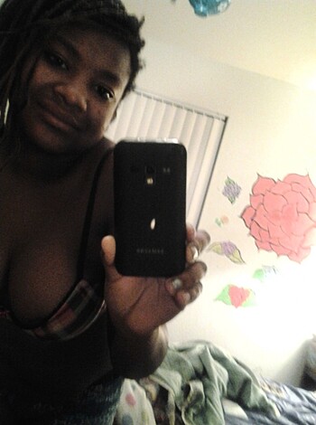 Here's a picture of some hot ass bitch snapping a selfie while flaunting her tits and ass in tight lingerie. Fuckin' check out that shit, man!