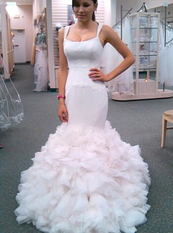 Here's the fucking picture of some slutty bitch in a dirty ass wedding dress with her fake tits hanging out and her cunt all wet for that cock she gonna suck later.