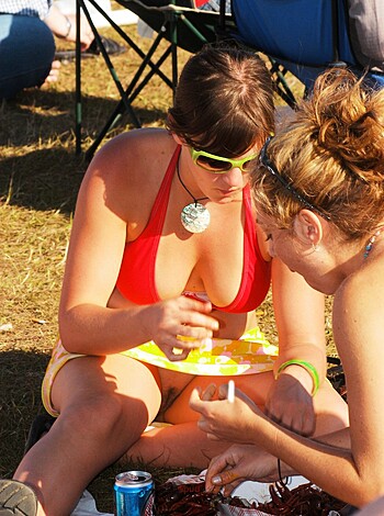 "Here's two hot chicks, one in a fucking sexy red bikini, chillin' out in some goddamn greenery."