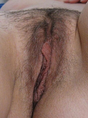 "F*ckin' take a look at this f*cked up cracked cunt! You can see the hairy snatch, and the shitty opening that looks like it was ripped apart by some asshole's meat stick! F*ckin' gross!"