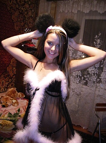 """
A bitch is dressed up in some Christmas-themed lingerie, looking like a fucking deer with its dick-hardening antlers sticking outta its head. 
"""