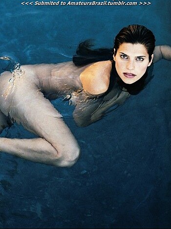 Here's a naked chick taking a dip in a pool.