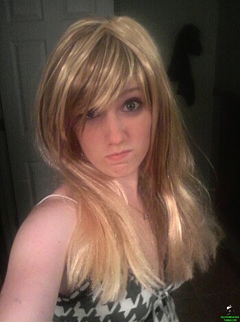 "Check out this hot bitch with the blonde weave, staring right into your fuckin' soul."