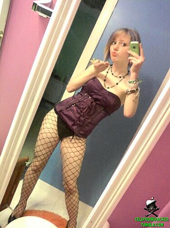 The bitch is wearing some nasty ass fishnet fucking stockings.