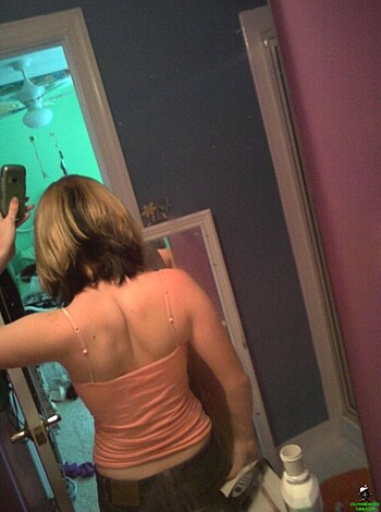 "Here's the limiter: In this pic you can see some fine ass on full display, bitch is taking a selfie in a pink top and denim shorts while that blue wall provides some nice background action. You might even call it sexy as fuck."