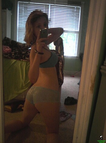 "Selfie bitch taking a pic in her panties on the reflect."