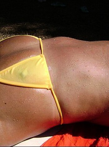 "Here's a shot of some chick in a yellow bikini, lying on her fucking beach towel, back view, dumbass."