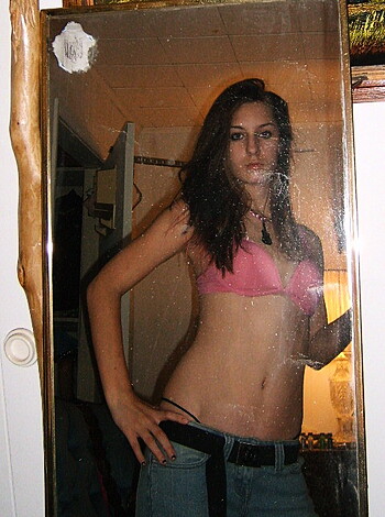 Fuckin hell man, check out that hot babe with the tight tits stuffed into her fucking pink bra. Her ass looks so damn good in those blue jeans I wanna rip them off her!