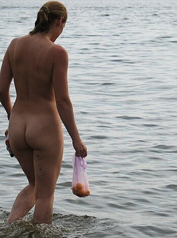 """
Look at this fucking hot bitch standing by the lake with her big tits and wet pussy on display.
"""