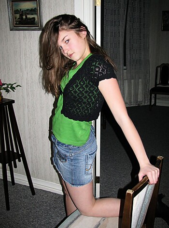 The chick is sporting a lime and lemon tank top.