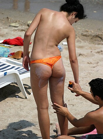"""
Dude rubbing his taint with sunblock.
"""