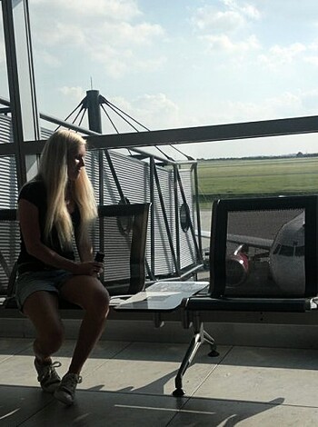 "Fuckin' lonely slut sits by herself at a shitty fuckin' airport, wishing someone would sit the fuck down next to her."