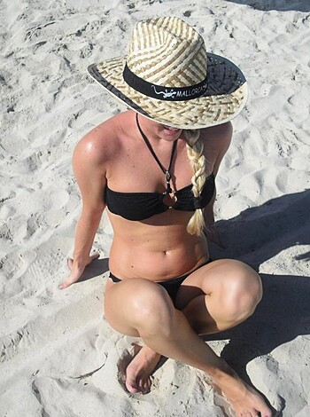 "Look at this hot babe in her itty-bitty thong, tanning her ass on the sand."