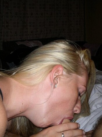 A guy is giving his girlfriend head while she rides him doggy style with her panties down around her ankles, he's fucking her face while she sucks his dick and moans in pleasure.