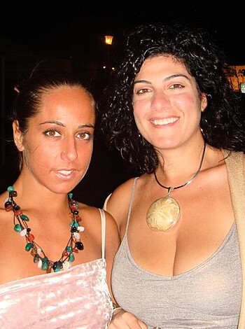Fuckin hell! Two bitches sporting some bling-bling, dawg!