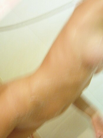 A naked self-fellating bitch with her mouth on her vagina and fingers deep inside of it, fucking herself until she cums, all caught on camera for your viewing pleasure.