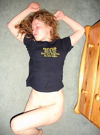 F*cking hot naked chick lying on her back with tits and pussy in full view, fingers flicking the air like a goddamn porno star.