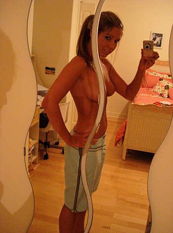 "F*cking hot chick flashing her tits in some green ass shorts."
