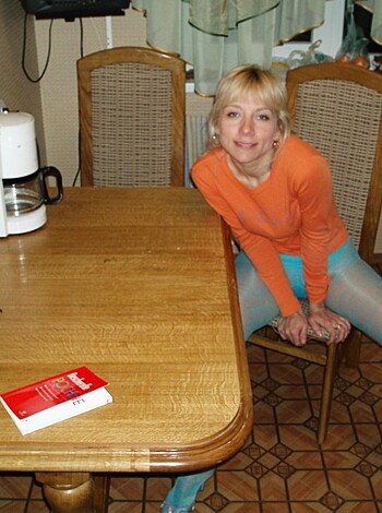 "Look at this fucking bitch on her ass sitting at a stupid table."