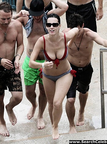Virginia slimed out in her skimpy bikini, getting ready to bounce on some dude's dick.