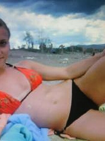 "Bitch is wearin' a red bikini, got her fuckin' leg all crossed up, sittin' on some stupid ass beach chair."