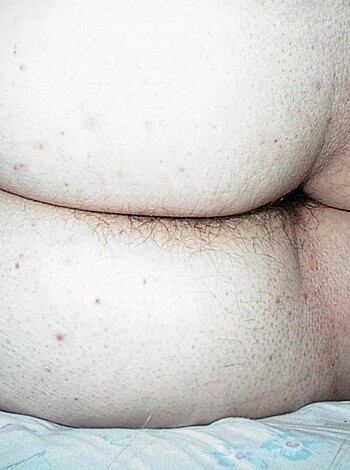 "Look at this fucking guy's hairy ass with a tiny dick and a wart on its asshole, I mean look at that shit."