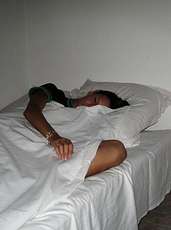 Here's the vulgar caption for that image:
"Check out this chick passed out naked in bed with her ass sticking out like a goddamn airport runway, looking all fuckin' comfy and shit."