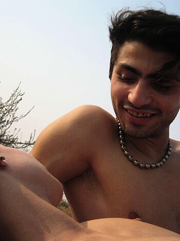 A horny pair having intercourse in an open space under the sun.