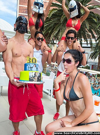 Here's some fucking douchebags at a goddamn pool party trying to look all sexy shit with a cake for Jesus Christ's birthday while they're probably all wearing piss-stained swim trunks and have pubes floating around in the damn water like little cockroaches.