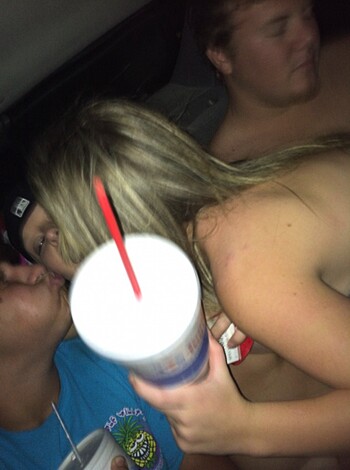 Here are some fuckin' drunken kids suckin' face and boozin' up in their motherfuckin' ride, y'all.