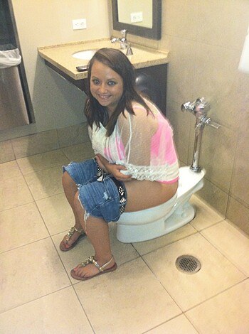 "Here's a photo of some chick, who looks like she might be taking a dump on the crapper."