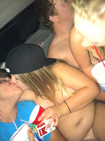 An unidentified group of fucking idiots getting their sloppy seconds on in an automobile.