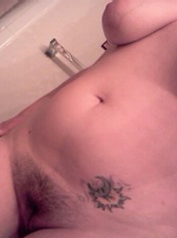 This image is a fucking naked bitch with her tits out and pussy exposed for all to see.
