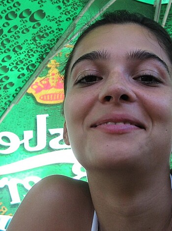 "Watch this f*cking b*tch grinning with her fat ass, basked under a motherf*cking beach umbrella like a spoiled cunt."