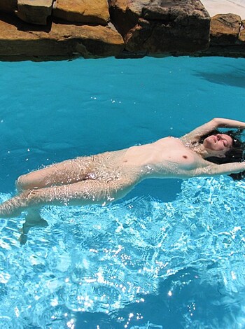 "Fucking hot nude chick taking a dip in the pool."