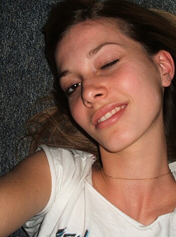"This bitch is taking a damn selfie while lying on her back."