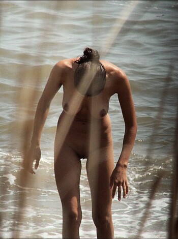 "Here's a hot, tits-out bitch in some fucking ass shoreline, dick."
