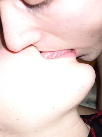 A fuckin' hot couple is goin' at it hard with their tongues deep inside the other person's mouth while gettin' their freak on in bed.