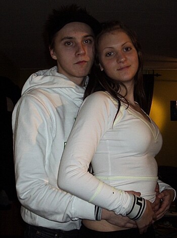 Here's a photo of a dude and chick all up on each other, gettin' freaky with the camera.