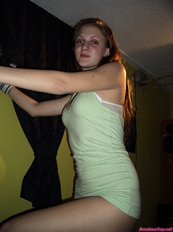 "Green bikini-clad broad bounces on mattress."