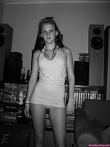 "Yo, check out this bitch in her lacy bra and panties, slouchin' on the couch."