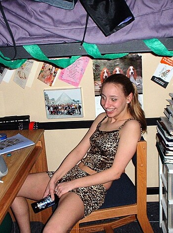 "Look at this fucking hot babe chillin' in her sexy-ass animal print panties, sittin' on her ass at a goddamn desk."