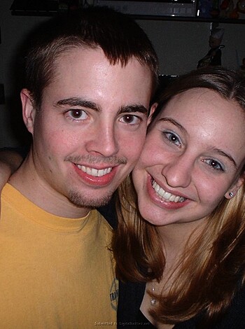 "Here's a fucking photo of two douchebags grinning like retarded chipmunks while they take their shitty, no-talent selfie."