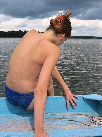 "Check out this hot chick in a bikini sitting her ass off on some fucking boat, bro."