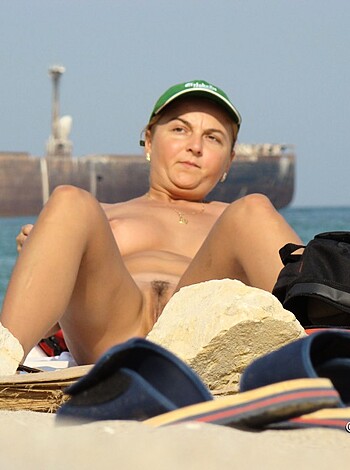 Vulgar description: "Look at this chick's cunt all exposed and everything. She's just sitting there, looking bored while her tits dangle down like a fuckin' beached whale."