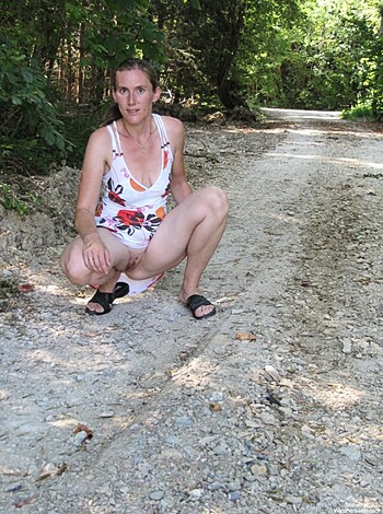 Here's a fucking bitch posin' nude as fuck in the motherfucking forest, ya dumbass caption.
