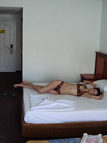 "Look at this fucking chick in her ugly bikini, sprawled out on her disgusting bed with all the shit around her."