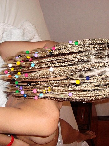 Here's a fucking close up of some bitch lying on her back with her hair all braided up in beads. You can see every single fucking detail of this shit, including her tits and pussy. Don't say I didn't warn you about the explicit content, motherfucker.