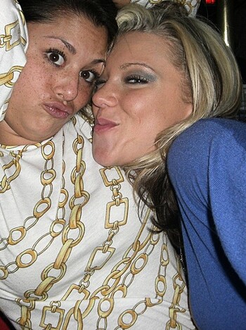 "A banging pair of chicks getting cozy with each other."
