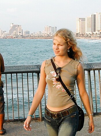 Vulgar Description: "Look at that fat ass bitch strolling down the shore with her denim shorts, barely covering her cellulite ass. What a fucking floral pattern she's got on, like she gives a shit about fashion. Shut the fuck up and keep walking."